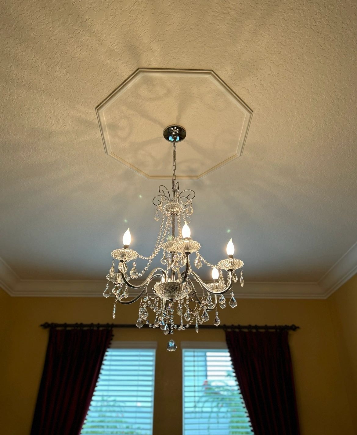 Octagon medallion. A built-up octagon around the chandelier.