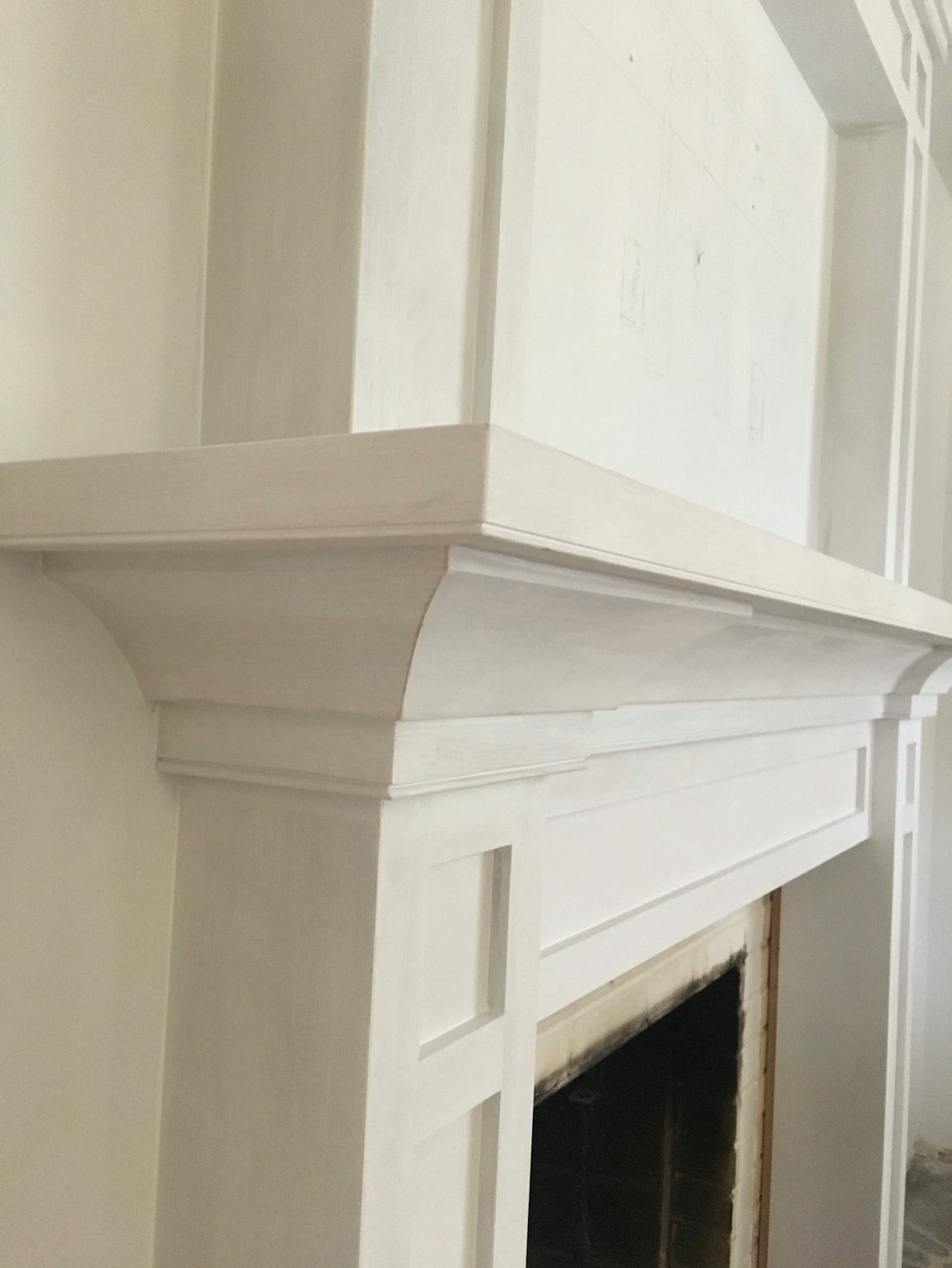 Surround detail. Layered moulding on the mantel shelf.