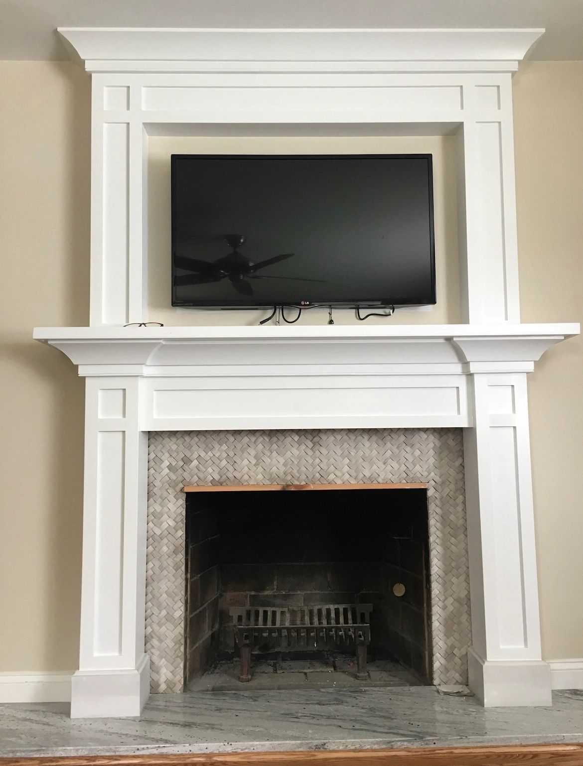 Painted fireplace surround. Full surround with overmantel, columns and crown.