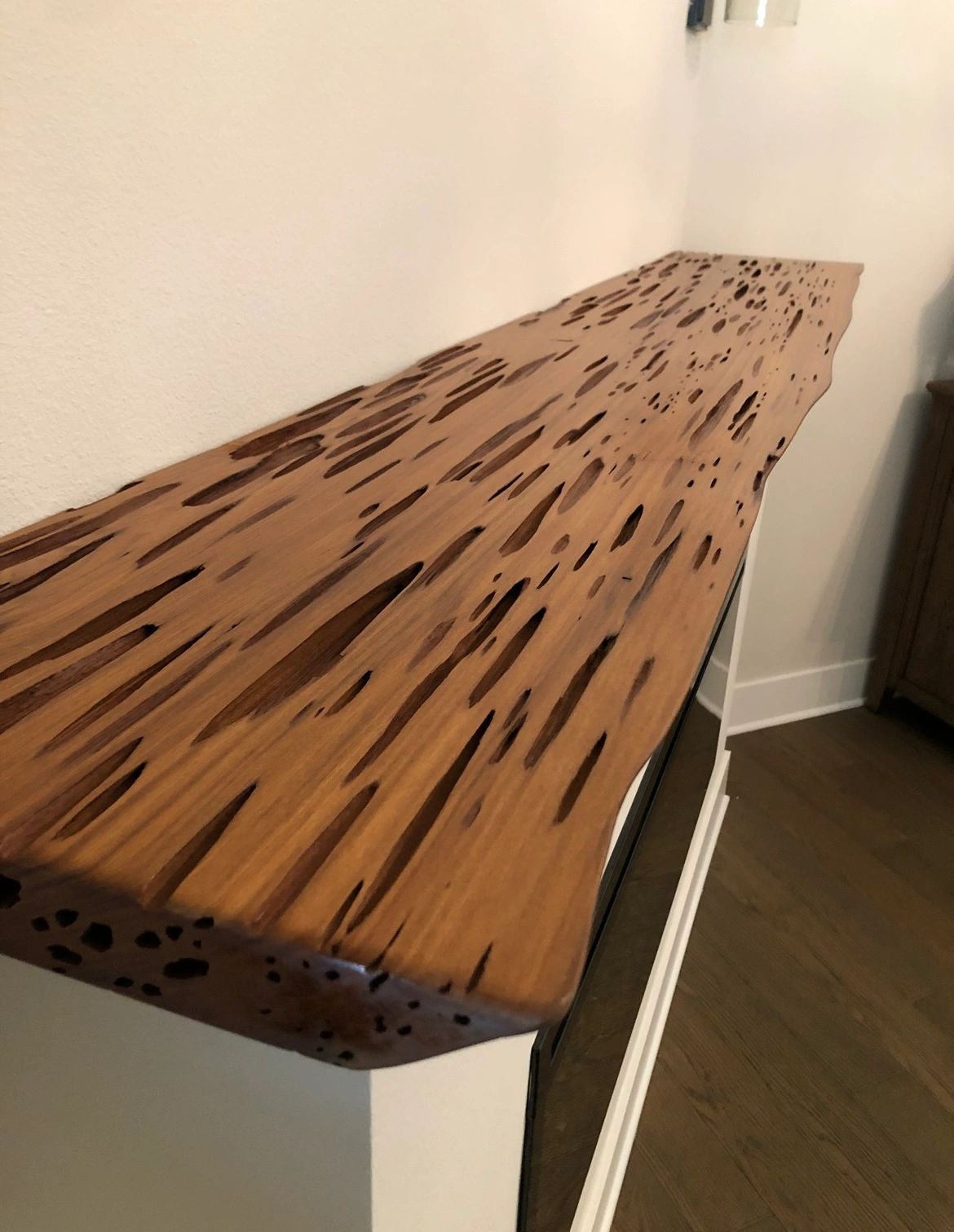 Pecky cypress bar top. Pecky cypress, every pocket left open.