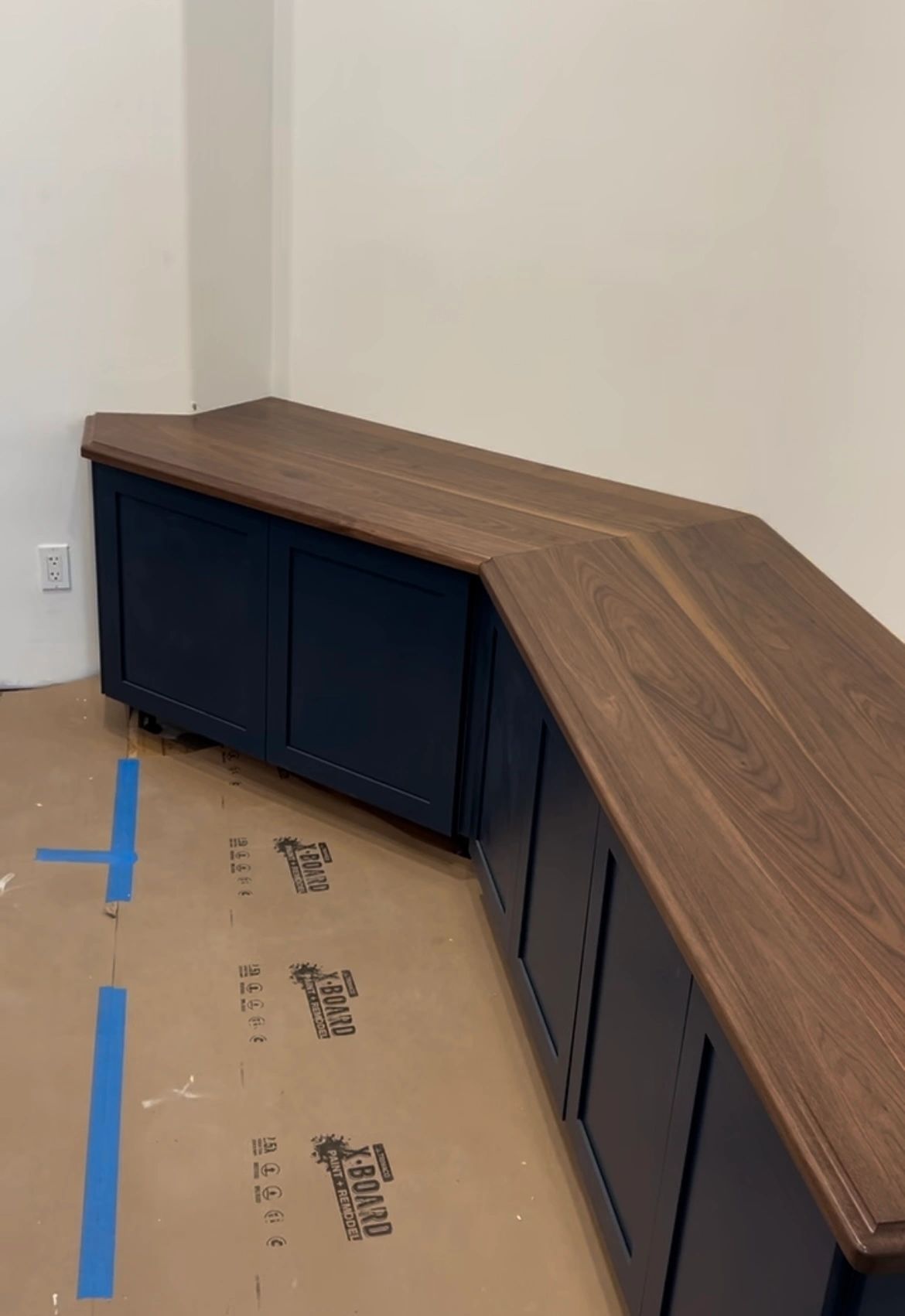 Angled walnut run. Walnut top following an angled cabinet run.